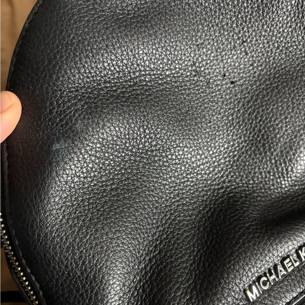 Michael Kors Black Leather Backpack with Silver Accents